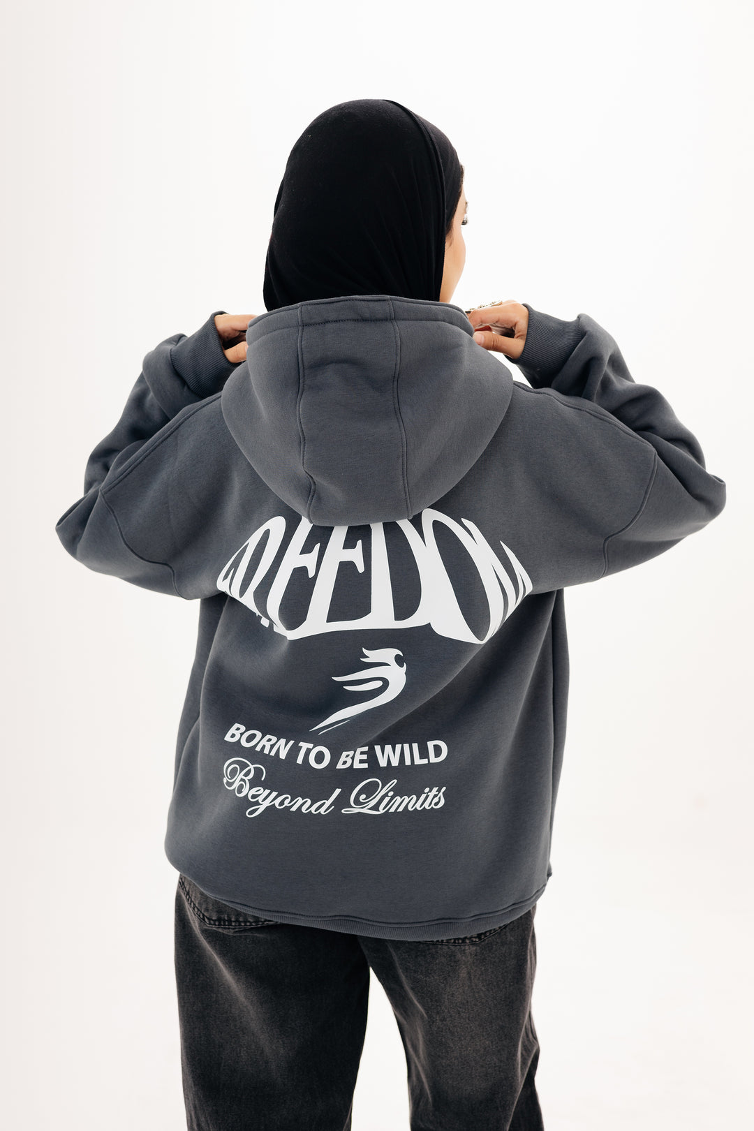 Unisex grey hoodie with Beyond Limits DTF back print by BLANCKA — on model
