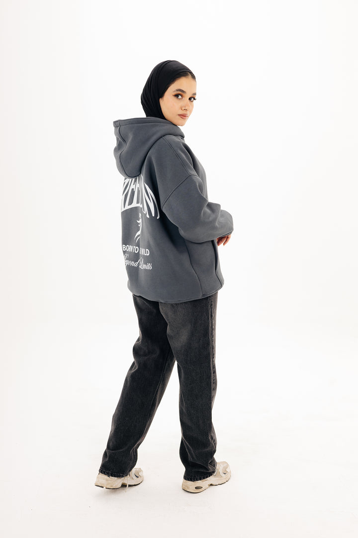 Unisex grey hoodie with Beyond Limits DTF back print by BLANCKA — on model
