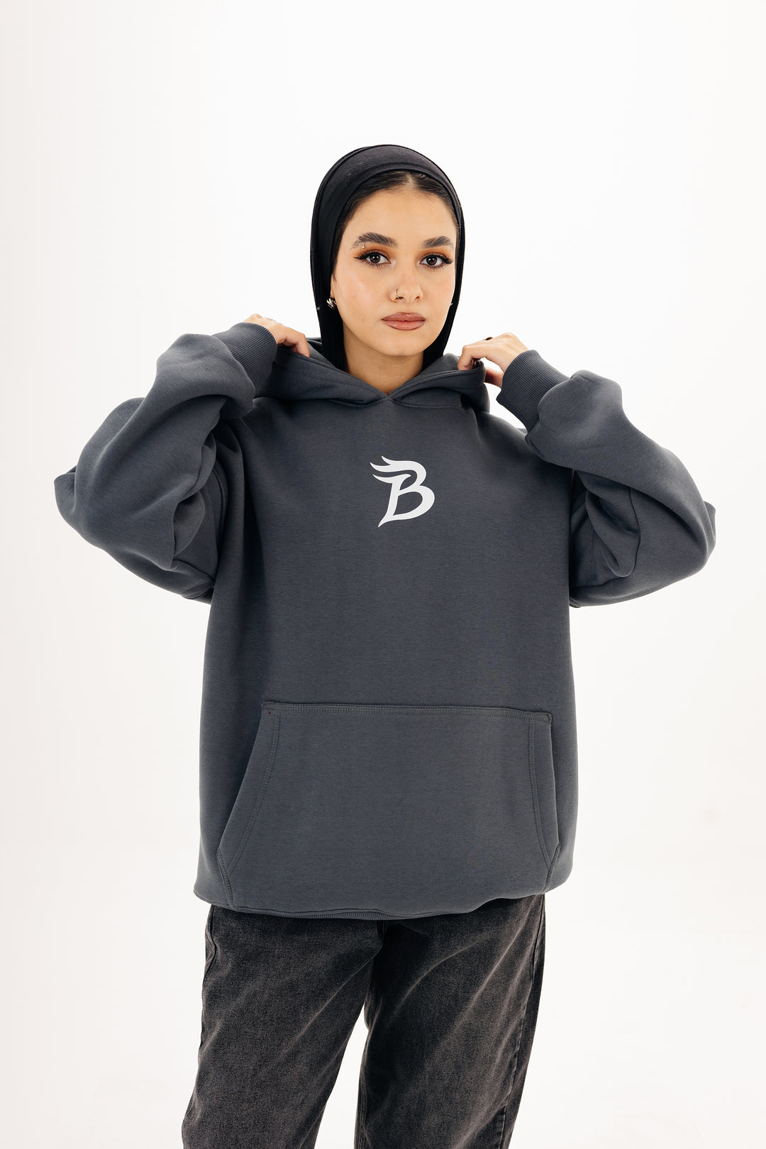 Unisex grey hoodie with Beyond Limits DTF back print by BLANCKA — on model
