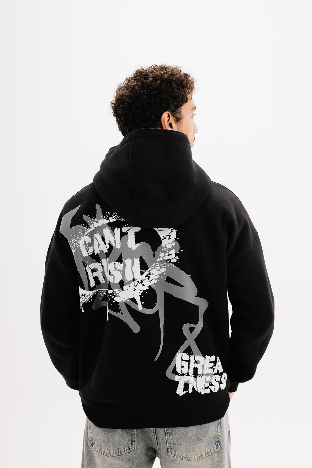 Unisex black hoodie with statement graffiti DTF print by BLANCKA — front and back view on model
