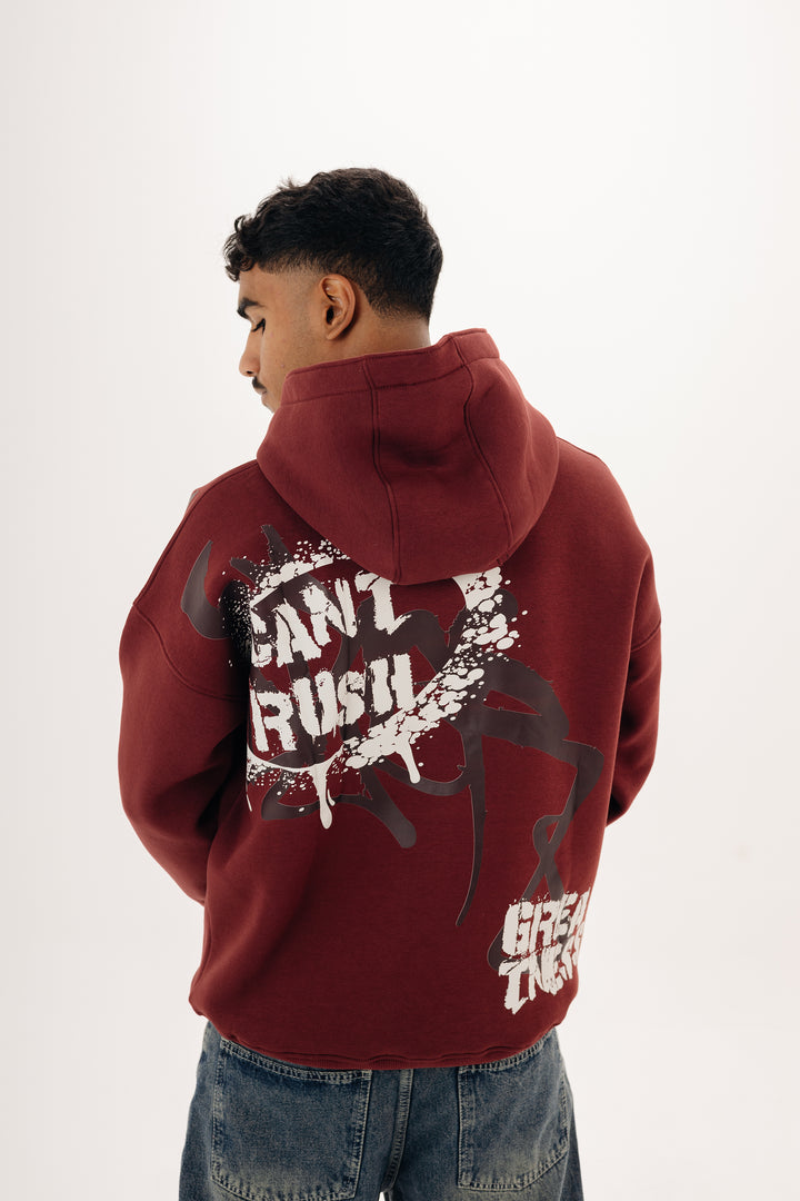Unisex burgundy hoodie with statement graffiti DTF print by BLANCKA — front and back view on model
