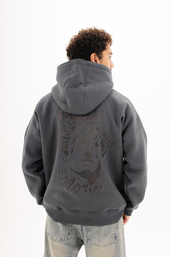 Unisex grey hoodie with black built beyond graphic by BLANCKA — front view on male model
Unisex grey hoodie with large back DTF print — back view on model

