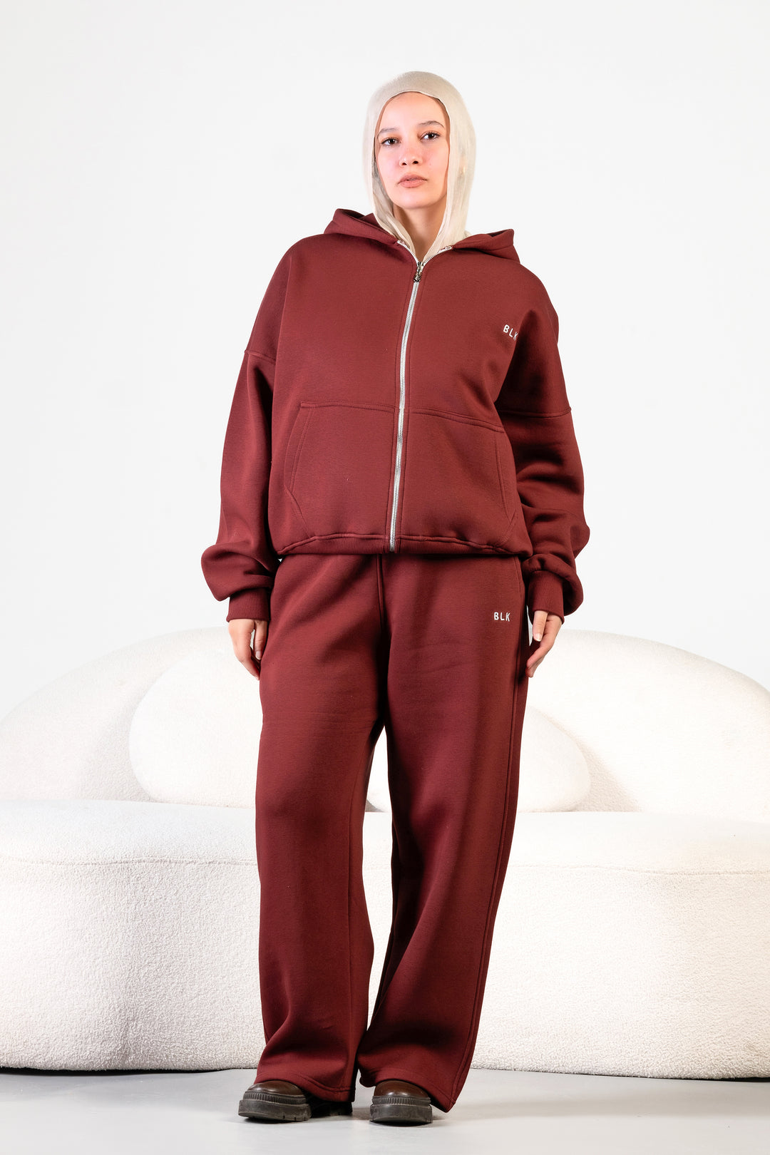 Unisex oversized zip hoodie set in charcoal grey with wide-leg sweatpants – BLANCKA Winter 2025.
