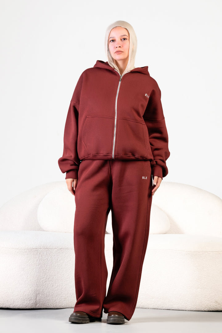 Unisex oversized zip hoodie set in charcoal grey with wide-leg sweatpants – BLANCKA Winter 2025.
