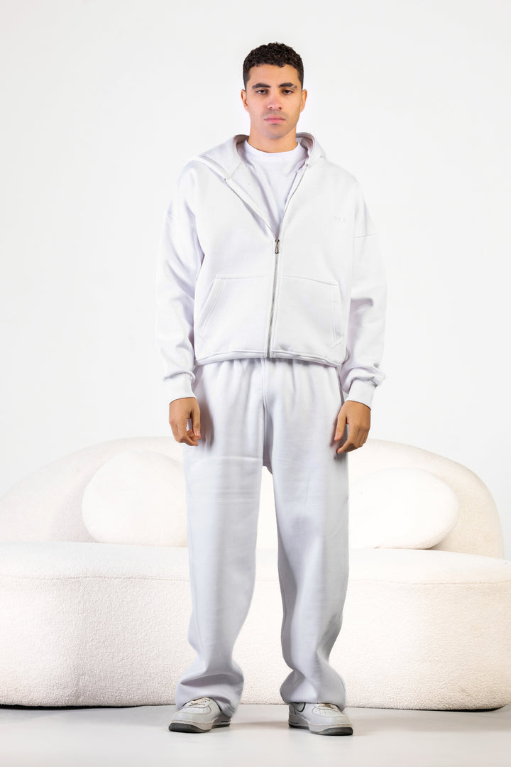 Unisex oversized zip hoodie set in charcoal grey with wide-leg sweatpants – BLANCKA Winter 2025.
